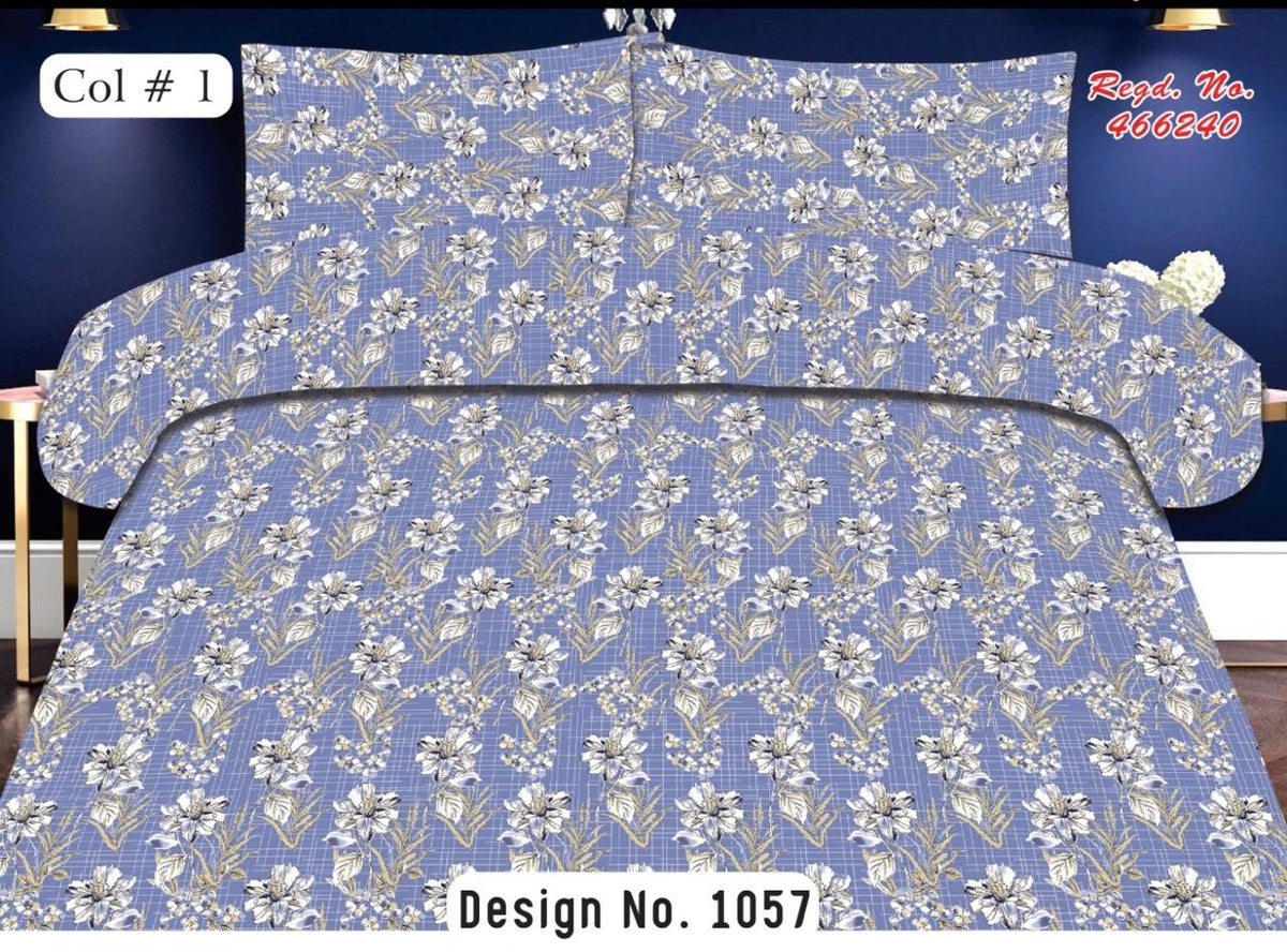 A bedding set featuring Flat sheet and two pillowcases with a blue and white floral pattern, displayed on a bed. The image includes text overlays indicating 'Col # 1', 'Design No.