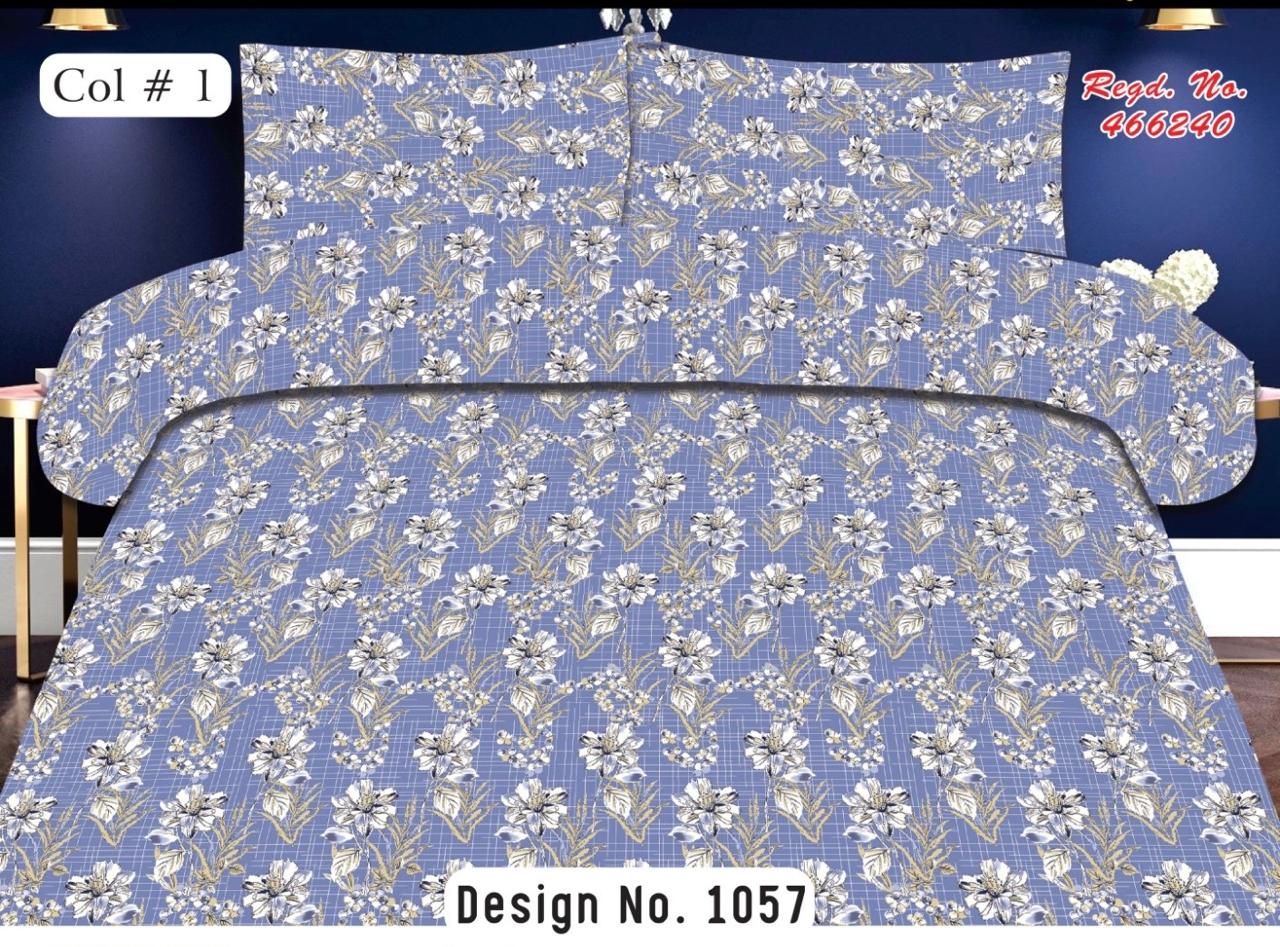 A bedding set featuring Flat sheet and two pillowcases with a blue and white floral pattern, displayed on a bed. The image includes text overlays indicating 'Col # 1', 'Design No.